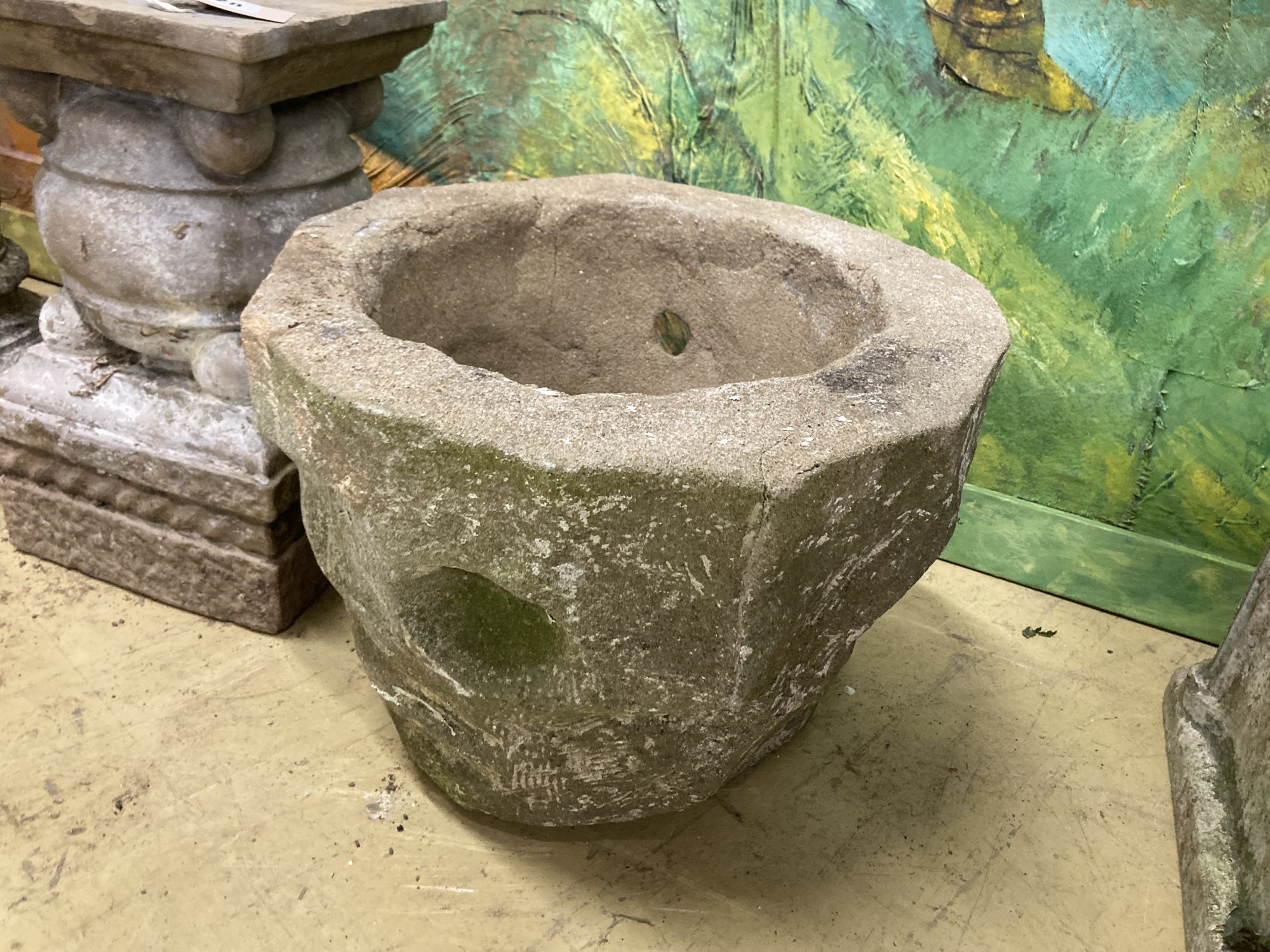 A reconstituted stone garden bird bath, 40cm diameter, height 78cm, a planter and a plinth